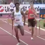 Runner wins 400m hurdle race despite having his penis constantly fall out of his shorts