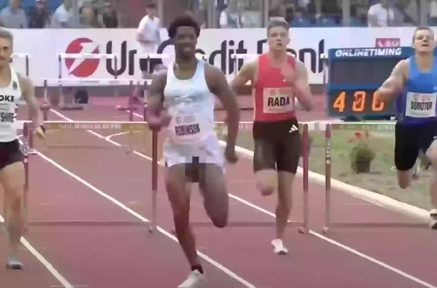 Runner wins 400m hurdle race despite having his penis constantly fall out of his shorts